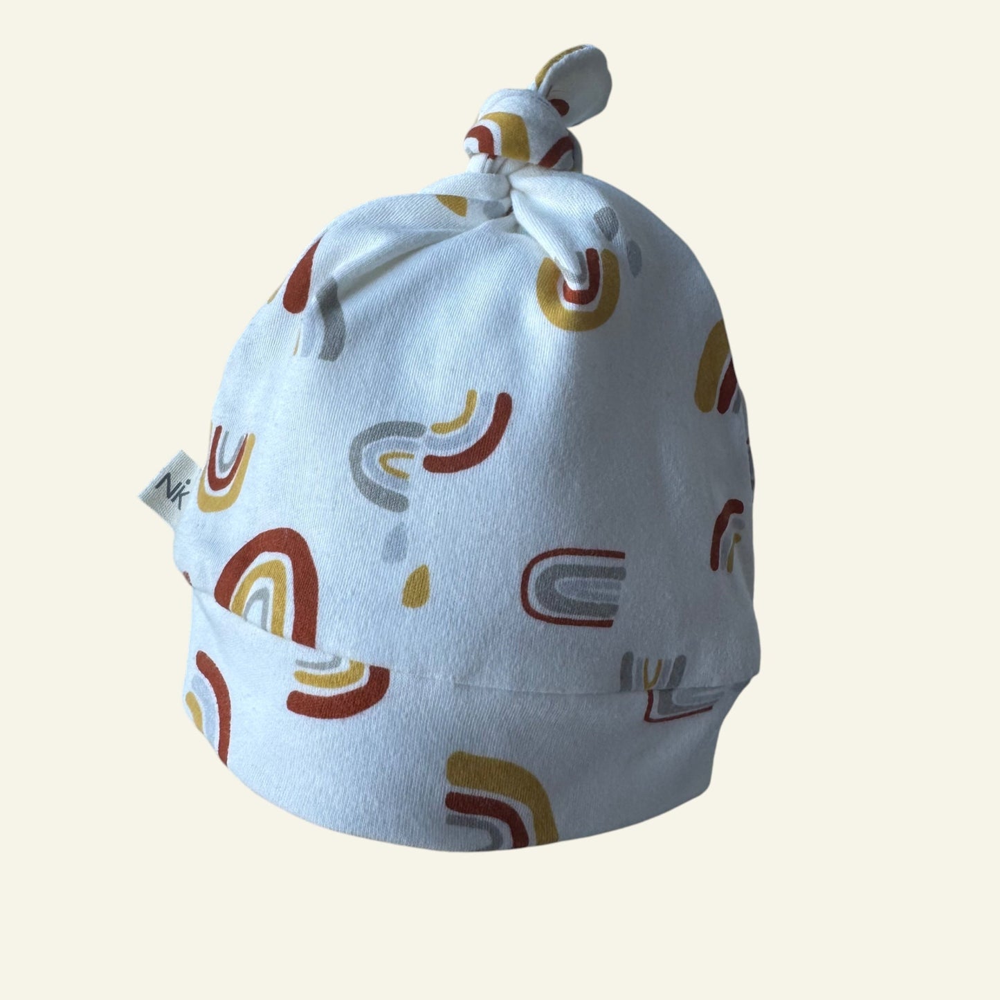 NK white rainbow newborn hat