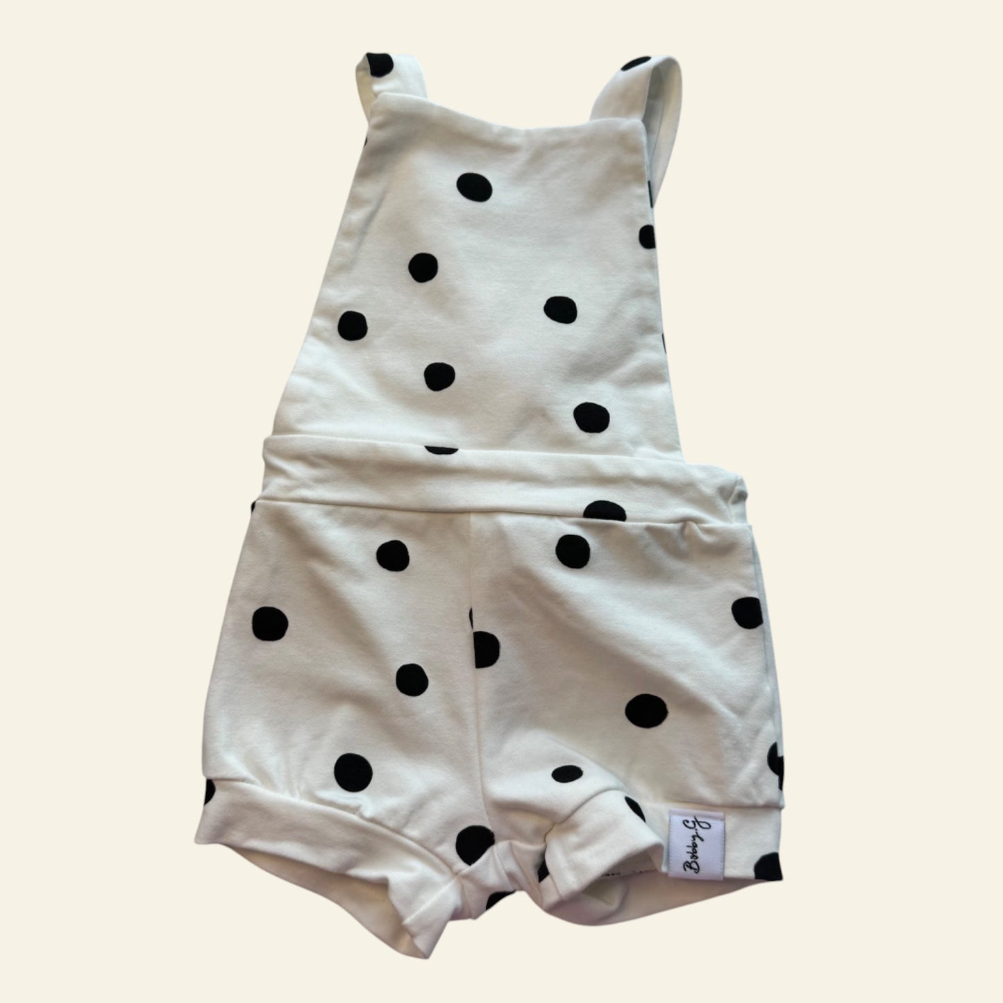 Bobby G white and black spot romper size 00