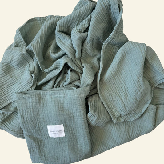 Country Road sage green swaddle OS