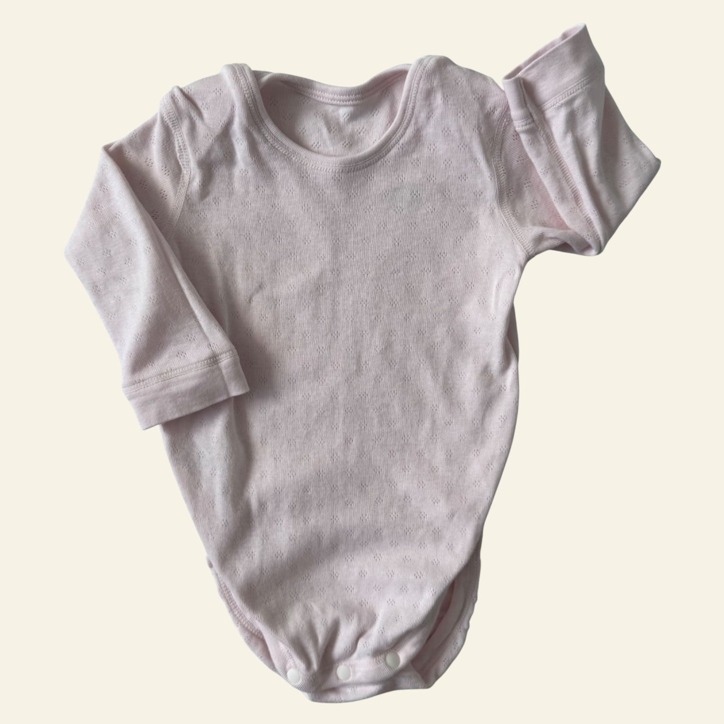 Uniqlo light pink onesie size 0