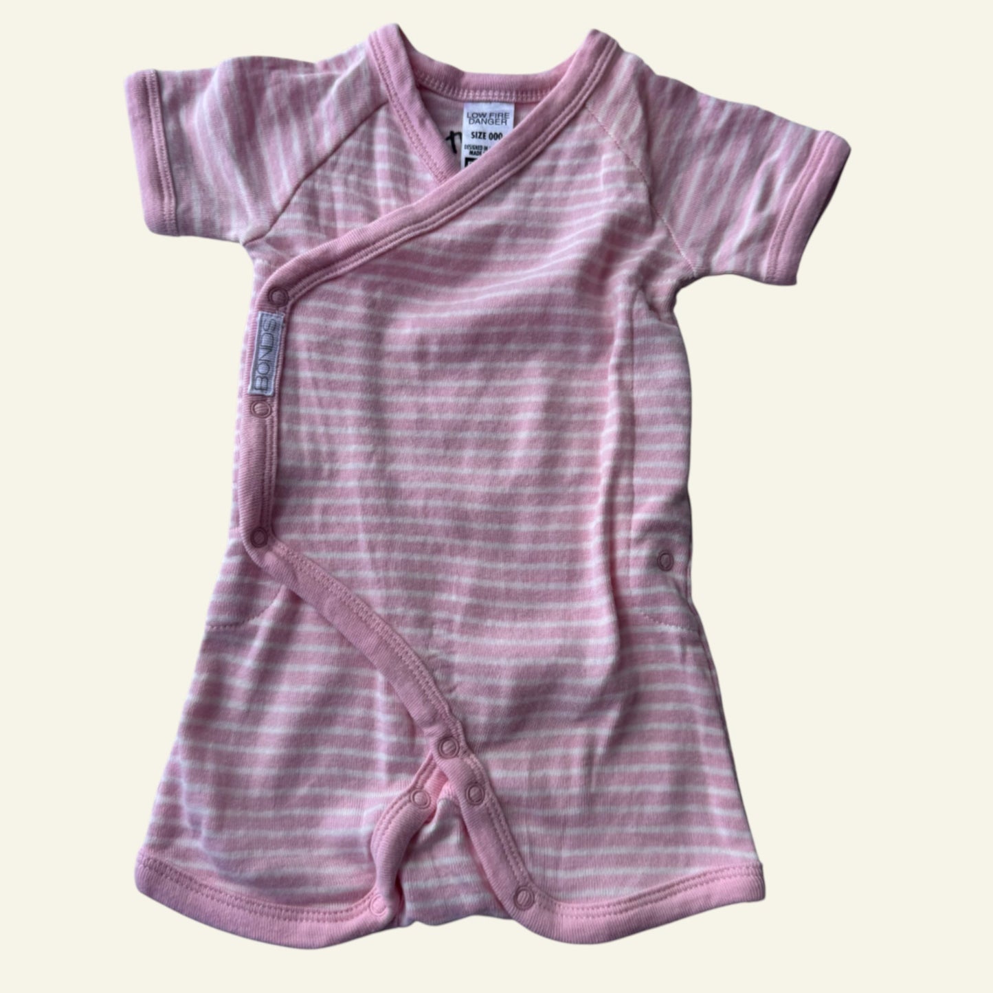 Bonds pink and white stripe romper size 000