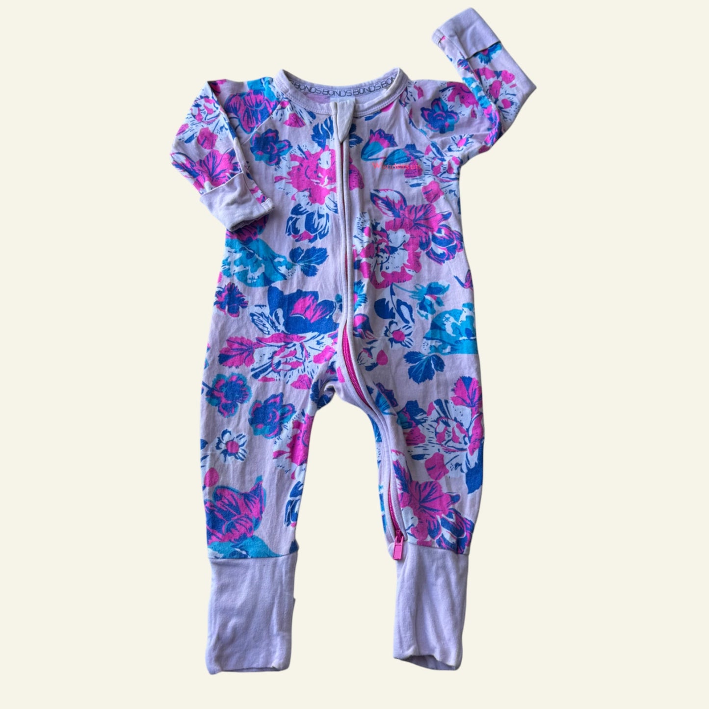 Bonds pink and blue floral wondersuit size 00 (Perfectly Imperfect)
