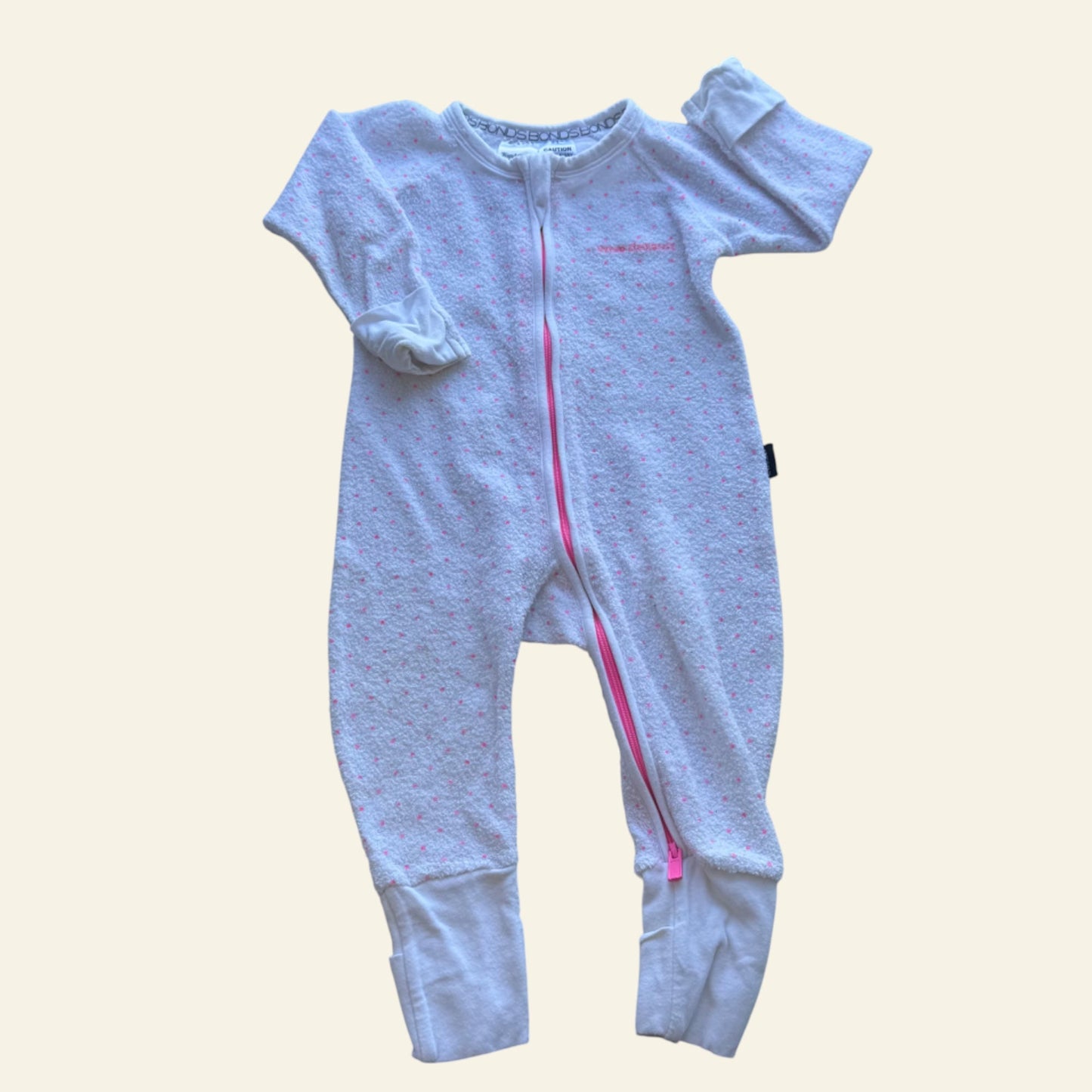Bonds white and pink spot poodlette wondersuit size 00