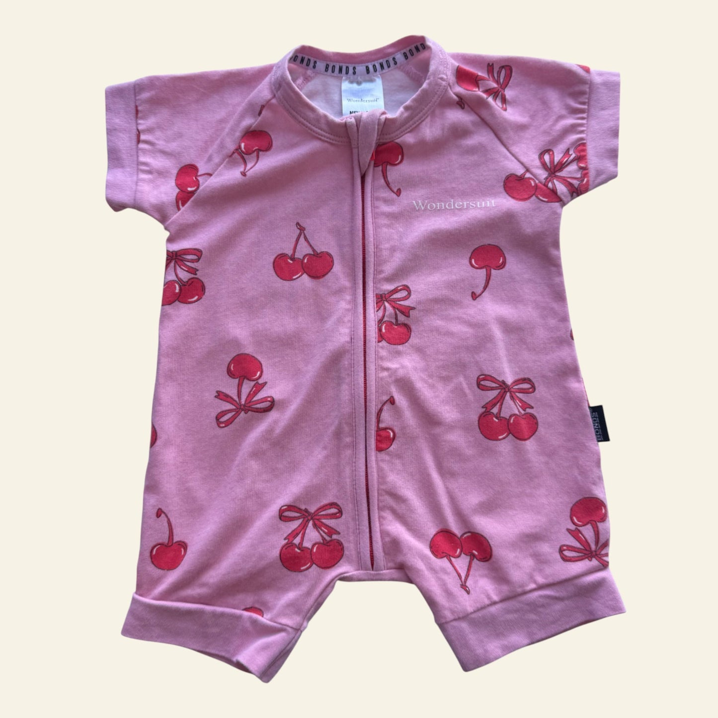 Bonds pink cherry short sleeve wondersuit size 0000